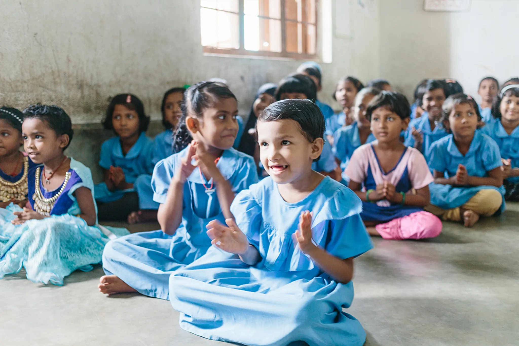 Young girls in their uniforms at the primary school in Rasulpur, India.